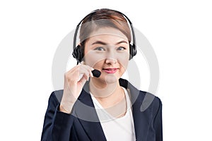 Portrait of beautiful young asian female customer service representative in headset looking at camera and smiling while isolated