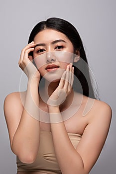 Portrait of beautiful young asian woman clean fresh bare skin concept