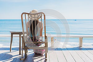 Portrait beautiful young asian woman happy smile relax around beach ocean and sea