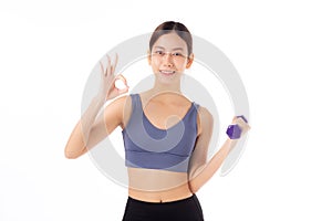 Portrait beautiful young asian woman lifting dumbbell gesture ok isolated white background.