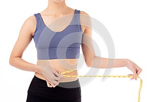 Portrait beautiful young asian woman measure tape with waist for weightloss with satisfied isolated.