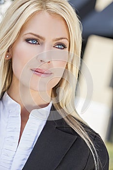 Portrait of Beautiful Young Blond Woman With Blue Eyes