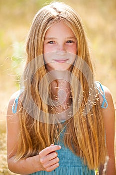 Portrait of a beautiful young blonde little girl