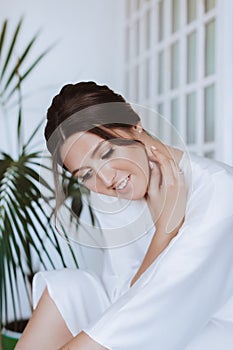 Portrait of beautiful young bride on her wedding day