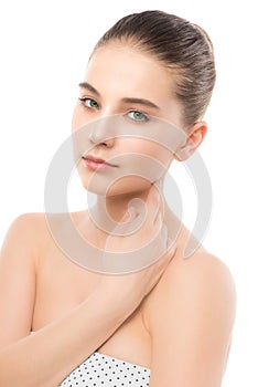 Portrait of beautiful young brunette woman with clean face. Isolated on a white.