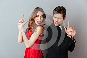 Portrait of a beautiful young couple dressed in formal wear