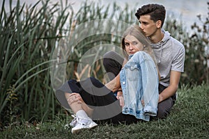 Portrait of a beautiful young couple in love. Teenagers. Man and woman outdoors