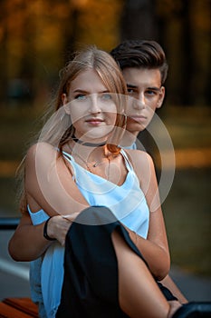 Portrait of a beautiful young couple in love. Teenagers. Man and woman outdoors