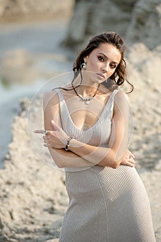 Portrait of a beautiful young girl on the beach