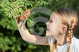 Portrait of a beautiful young girl in park