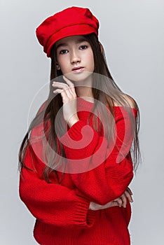 Portrait of beautiful young girl posing in studio.