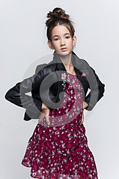 Portrait of beautiful young girl posing in studio.