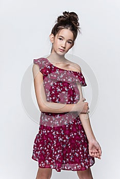 Portrait of beautiful young girl posing in studio.