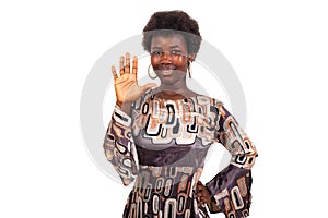 portrait of a beautiful young girl showing her palm smiling