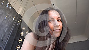 Portrait of a beautiful young hispanic woman close-up indoors