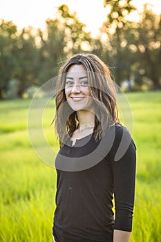 Portrait of a beautiful young hispanic woman outdoors