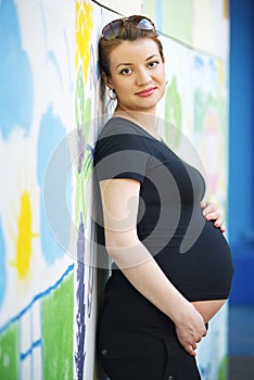 Portrait of beautiful young pregnant woman