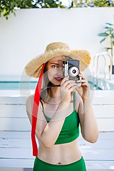 Portrait beautiful young red hair woman relax smile leisure around outdoor swimming pool nearly sea beach ocean for holiday vacati