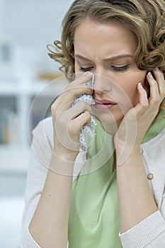 Portrait of beautiful young sad woman crying