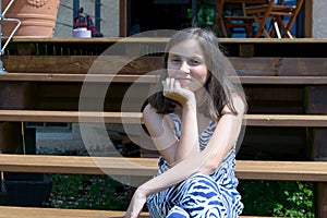 Portrait of beautiful young smiling teen girl, outdoor