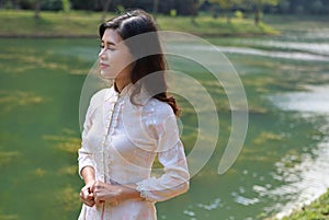 Portrait of Beautiful young thoughtful Asian woman