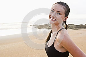 Portrait of beautiful young woman at beach