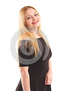 Portrait of a beautiful young woman in a black dress isolated on a white background