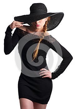 Portrait of a an beautiful young woman in black hat