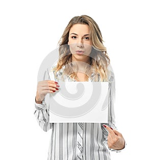 Portrait of beautiful young woman with blank paper sheet on white background