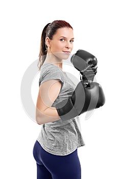 Beautiful young woman with boxing gloves