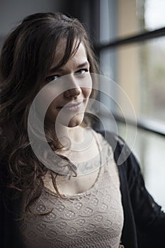 Portrait of Beautiful Young Woman with Brown Hair