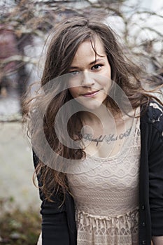 Portrait of Beautiful Young Woman with Brown Hair