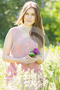 Portrait of a beautiful young woman with brown hair