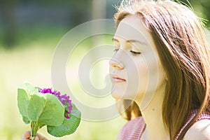 Portrait of a beautiful young woman with brown hair