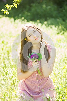 Portrait of a beautiful young woman with brown hair