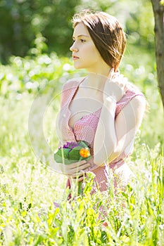 Portrait of a beautiful young woman with brown hair