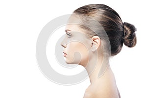 Portrait of beautiful young woman with clean skin isolated