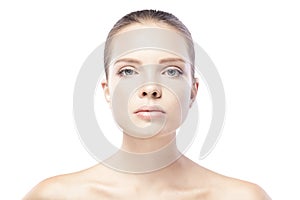 Portrait of beautiful young woman with clean skin isolated