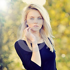 Portrait of a beautiful young woman close up