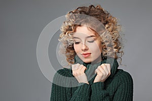 Portrait of beautiful young woman on color background