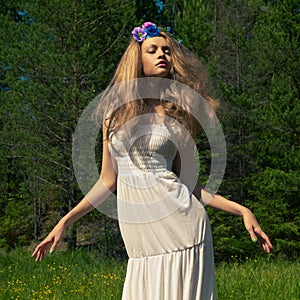 Beautiful dancing lady in the forest
