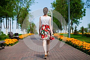 Portrait of beautiful young woman in dress