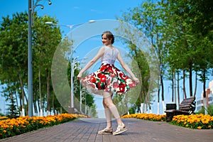 Portrait of beautiful young woman in dress