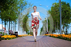 Portrait of beautiful young woman in dress