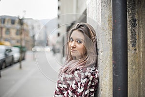 Portrait of beautiful young woman looking at camera.