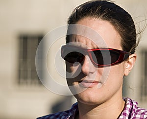 Portrait of a beautiful young woman outside