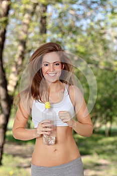 Portrait of a beautiful young woman running