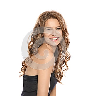 Portrait of beautiful young woman with shiny wavy hair