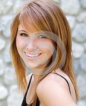 Portrait of a beautiful young woman smiling