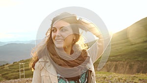 Portrait of a beautiful young woman at sunset. Close-up, shallow DOF.